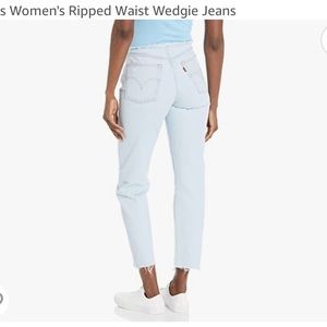 Levi’s ripped waist wedgie jeans.